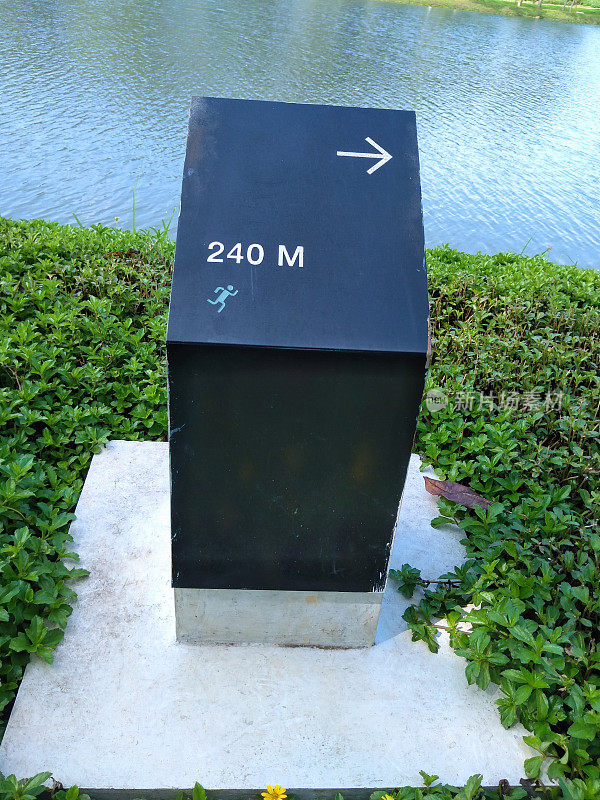 a symbolic stone that serves as a guide to the lake area of ​​the BSB Semarang settlement